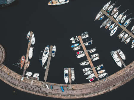 Aerialphoto yacht club with a breakwater. Yachts, motor boats, sailboats, berths, piersの写真素材