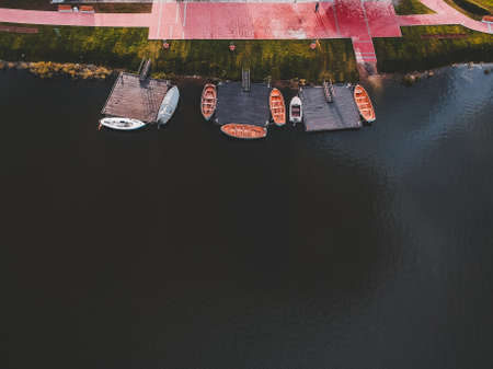 Aerial view to the boathouse. Rowing training boats moored to the pier. Russia, St. Petersburgの写真素材
