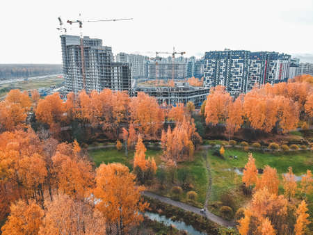 Aerial view for the construction of a residential building, tower crane. Autumn, St. Petersburg,...