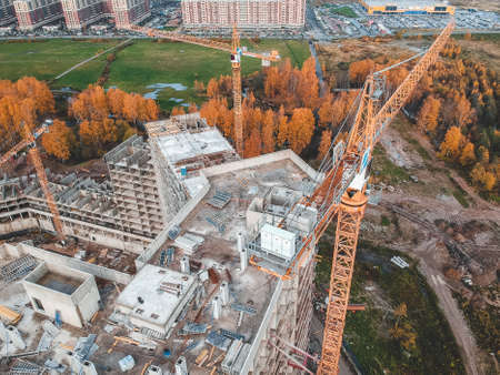 Aerial view for the construction of a residential building, tower crane. Autumn, St. Petersburg,...