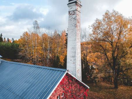 Aerial view of the house on the background of the forest. Photo taken from a drone. Finland,...