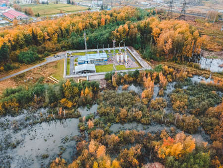 aerialphoto water treatment plants, factory in the coniferous forest. The Solid Contact Clarifier...