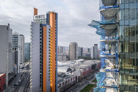 Aerial view for the construction of a skyscraper, scaffolding, barriers, workers. 03.01.2020...