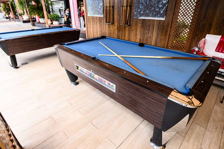 blue pool table in the gaming area of the Siam Mall shopping center. 07.01.2020 Tenerife, Canary Islands.のeditorial素材