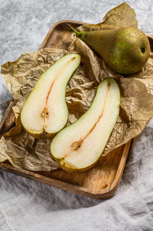 Seasonal ripe pears. Farm eco fruits. Gray background. Top view.
