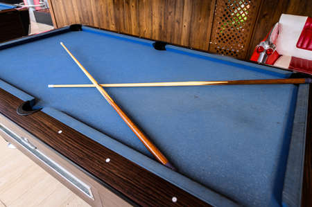 blue pool table in the gaming area of the Siam Mall shopping center. 07.01.2020 Tenerife, Canary Islands.のeditorial素材