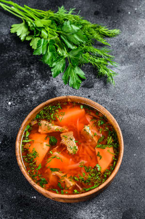 Russian speciality Borsch soup with beetrots and sour cream. Black background. Top view.の写真素材