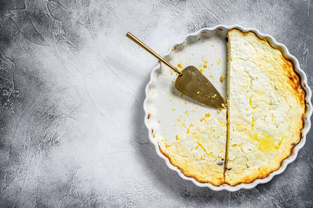 Curd casserole in a baking dish. Gray background. Top view. Copy space.の写真素材