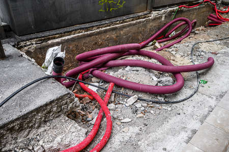 Repair of communications and road surface in the historical center of the city. 03.01.2020 Barcelona, Spain.のeditorial素材