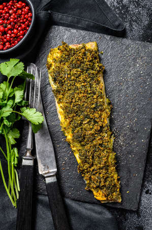 Fried fish fillet hake. Organic seafood. Black background. Top view.の写真素材