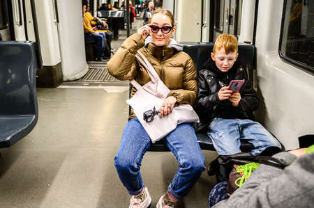 Train on the platform with passengers. People in the train. 03.01.2020 Barcelona, Spain.のeditorial素材