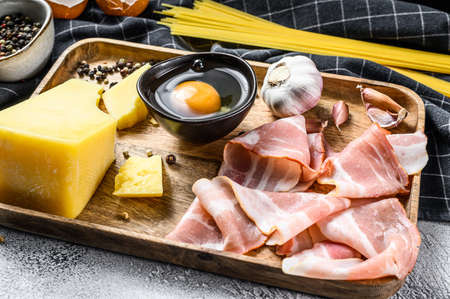 Ingredients for Pasta Carbonara. Traditional Italian food. Gray background. Top view.の写真素材
