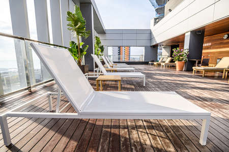 Swimming pool on roof top with beautiful city view of the skyscrapers. . Premium hotel. 03.01.2020...