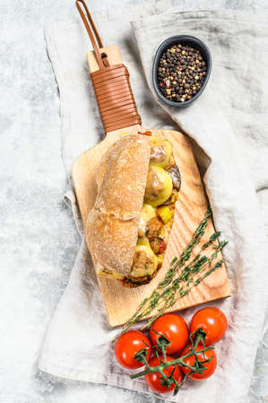 Submarine sandwich with meatballs. Gray background. Top view.の写真素材