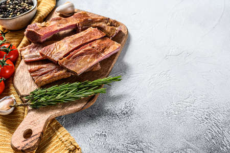 Homemade Smoked Barbecue Pork spare Ribs. White background. Top view. Copy space.の写真素材