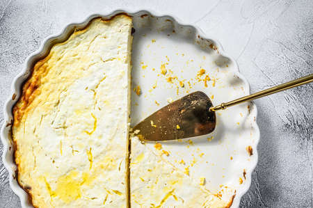 Cottage cheese casserole in a baking dish. Gray background. Top view.の写真素材