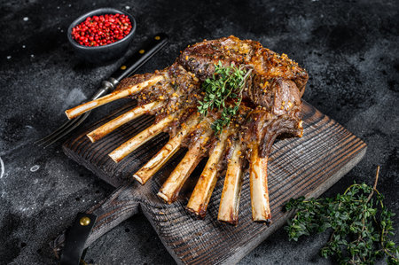 Barbecue rack of lamb meat chops. Black background. Top view.の写真素材