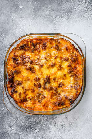 Classic Lasagna with bolognese sauce in a baking dish. White background. Top viewの写真素材