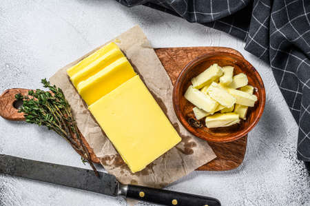 Block of fresh Butter, dairy farm products. Gray background.Top viewの写真素材