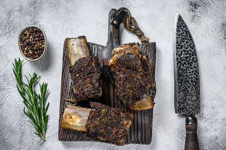 Barbecue short chuck beef ribs with herbs. White background. Top viewの写真素材