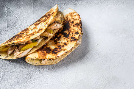 Cheesy Chicken roast Quesadilla. White background. Top view. Copy spaceの写真素材
