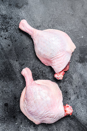Free range raw Duck legs. Black background. Top viewの写真素材