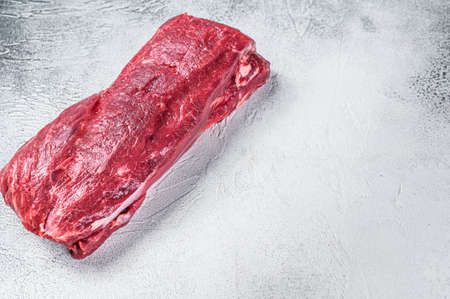 Raw Whole Tenderloin beef meat. White background. Top view. Copy spaceの写真素材