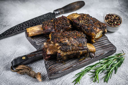 Barbecue short chuck beef ribs with herbs. White background. Top viewの写真素材