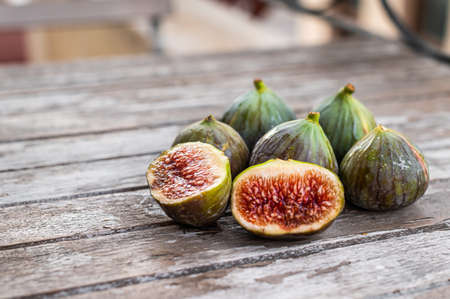 Healthy Organic Green Figs. Top view. Wooden background. Copy spaceの写真素材