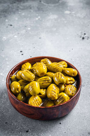 Grilled green organic olives. Gray background. Top viewの写真素材