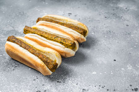Vegan hot dog with meatless Vegetarian sausage. Gray background. Top view. Copy spaceの写真素材