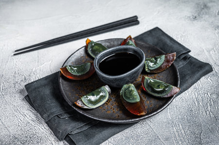 Preserved duck eggs or Century eggs, Chinese cuisine. white background. top view.