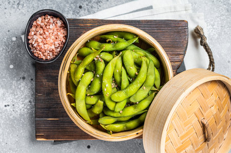 Steamed Edamame Beans with sea salt, soy beans. gray background. top view.の写真素材