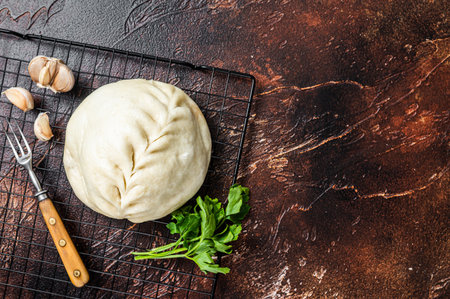 Pyan-se, Pyanse - Traditional Korean steamed pie bun with vegetable and meat. dark background. top view. copyspace.の写真素材