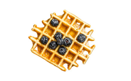 Belgian homemade waffles with blueberry and Syrup . isolated on white backgroundの写真素材
