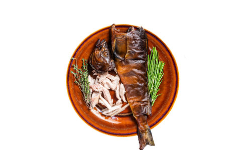 Fillet of Hot smoked fish perch in a rustic plate with thyme. isolated on white backgroundの写真素材