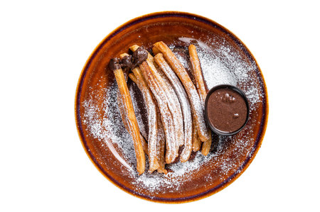 Spanish tapas churros with sugar and chocolate sauce. isolated on white backgroundの写真素材