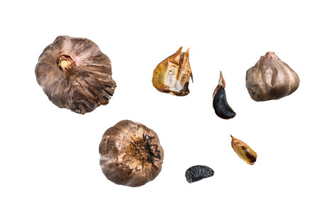 Whole balsamic fermented black garlic. isolated on white backgroundの写真素材