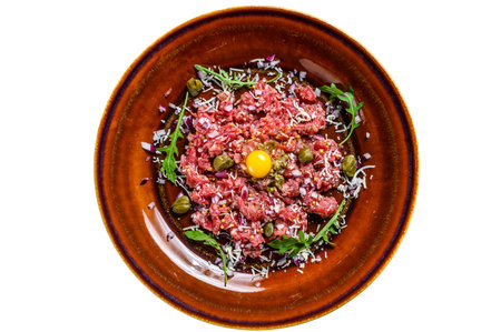 French cuisine Beef tartare with raw egg yolk. isolated on white backgroundの写真素材