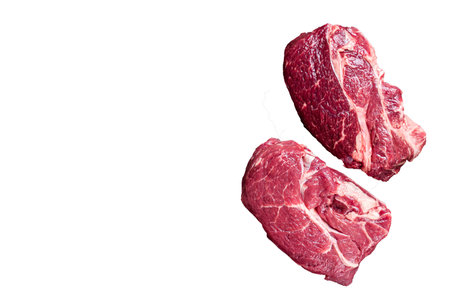 Raw Chuck eye roll beef steak on butcher table. High quality Isolate, white background