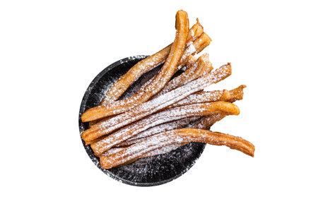 Traditional Mexican dessert churros with sugar powder in a pan. Isolated on white backgroundの写真素材
