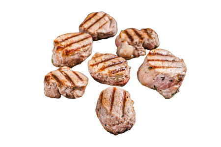 Fried pork medallions steaks from tenderloin meat on a grill skillet. Isolated, white backgroundの写真素材