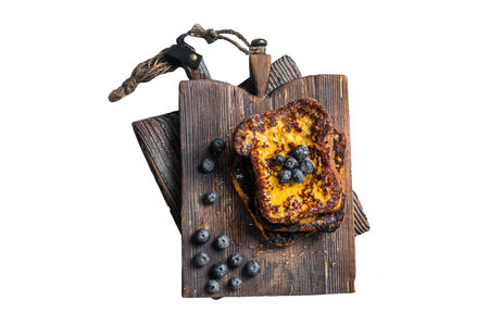 Blueberry French Toast with honey on wooden board. Isolated, white backgroundの写真素材