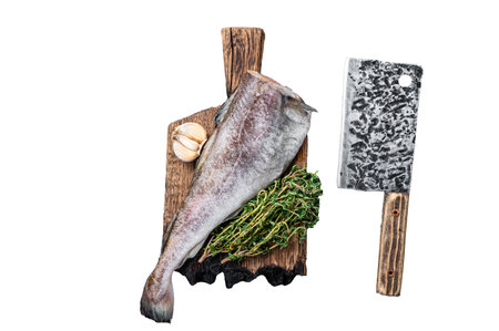 Fresh Raw cod or codfish fish on wooden board with cleaver. Isolated on white background