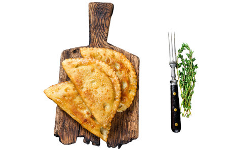 Mexican chilean food fried empanadas pie with beef meat. Isolated on white background, top viewの写真素材