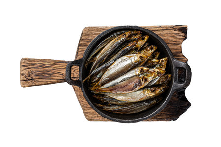Hot Smoked sprat and Anchovy fishes in pan. Isolated on white background, top viewの写真素材