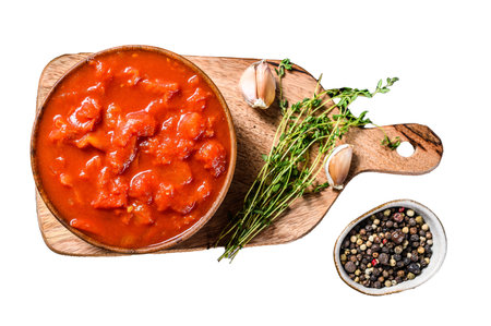 Canned chopped tomatoes, tomato sauce in a bowl. Isolated on white background. Top viewの写真素材