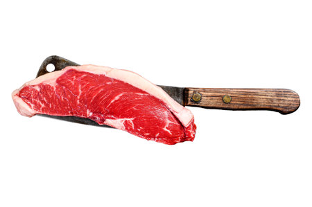 Raw sirloin steak on a cleaver. Marble beef. Isolated on white background. Top viewの写真素材