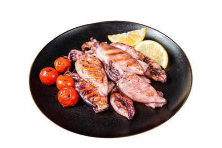 Seafood diner with grilled squid, calamary in a plate. Isolated on white background. Top view