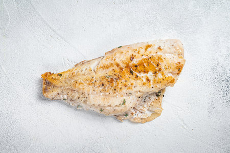 Grilled sea red pepper fillet, Snapper fish. White background. Top view. Copy space.